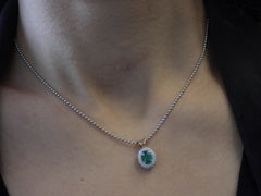 Oval Emerald with Two Rows of Diamonds