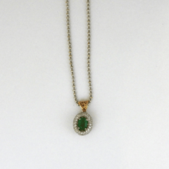 Oval Emerald with Two Rows of Diamonds